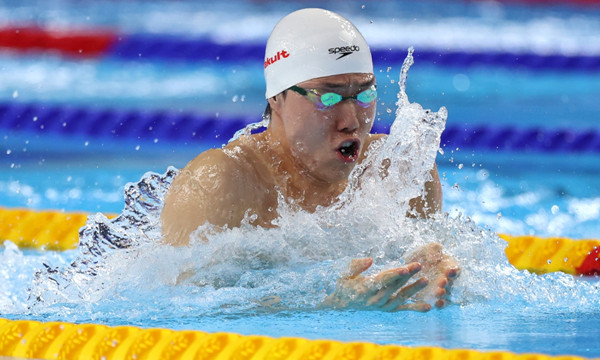 Qin Haiyang of Team China competes in the Men's 50m Breaststroke Final of the Singapore 2025 World Aquatics Championships at World Aquatics Championships Arena on July 30, 2025 in Singapore. Phot: VCG 102_副本.jpg